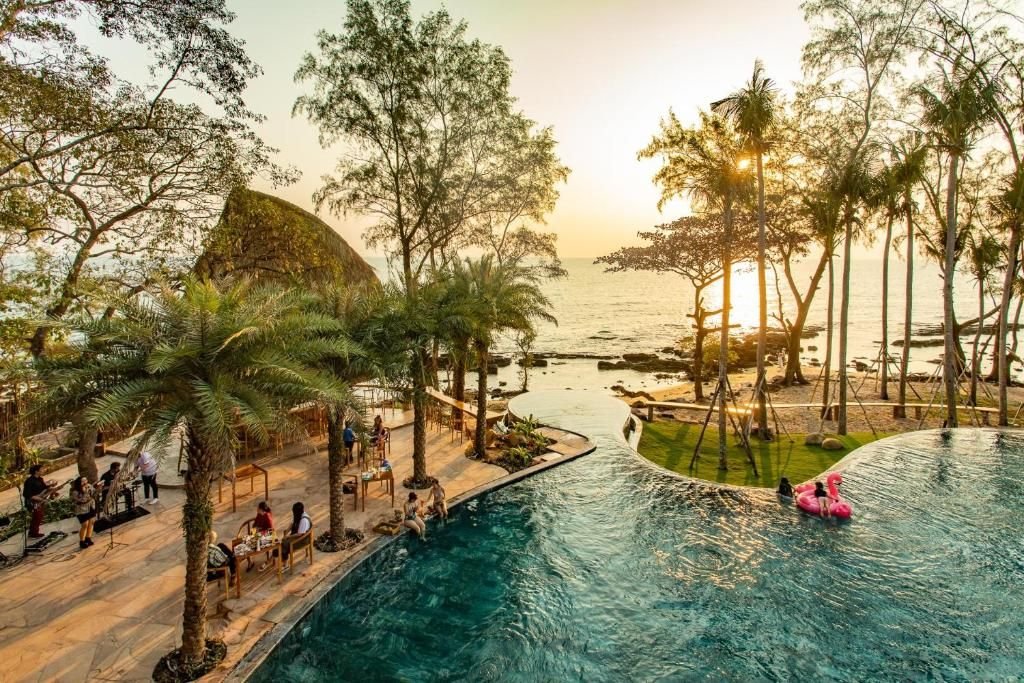 Beach resort pool at sunset, Phu Quoc